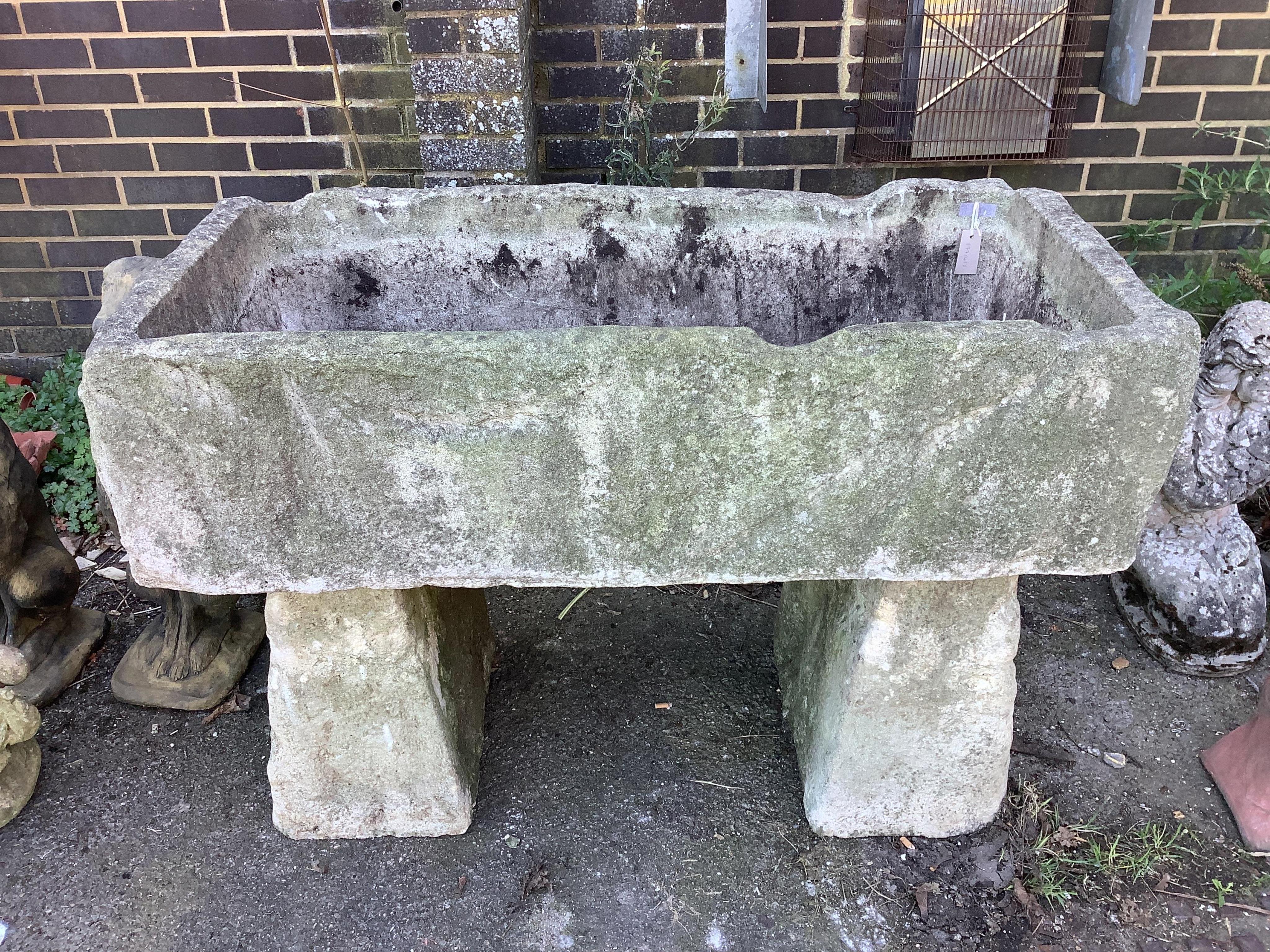 A stone trough, width 122cm, depth 60cm, height 84cm. Condition - fair
